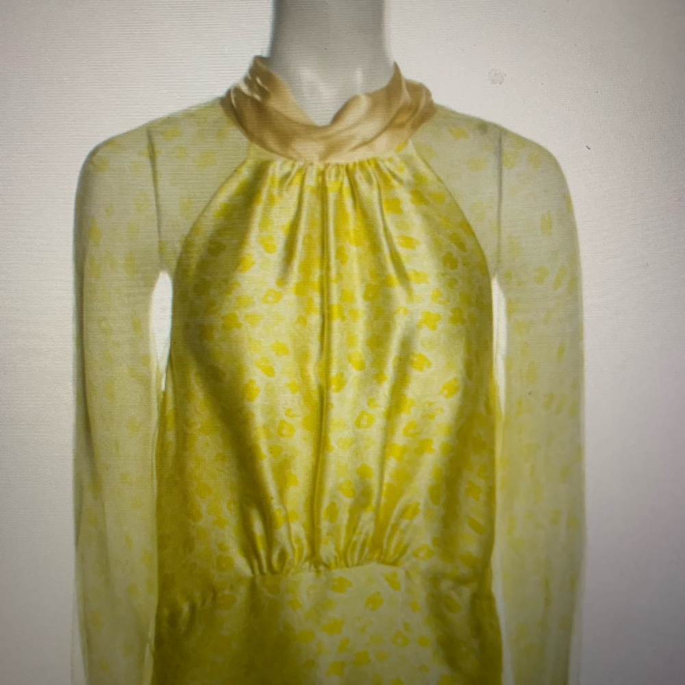 Silk blouse size small. Yellow floral print open back. Long sleeve.